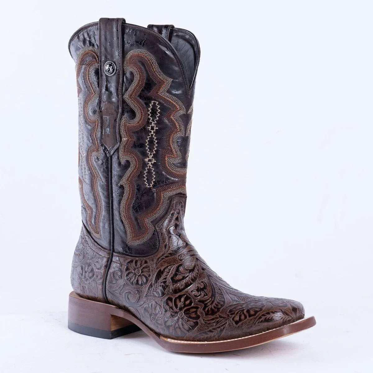Tanner Mark hand tooled brown western boots at Teres Western Wear in Dallas