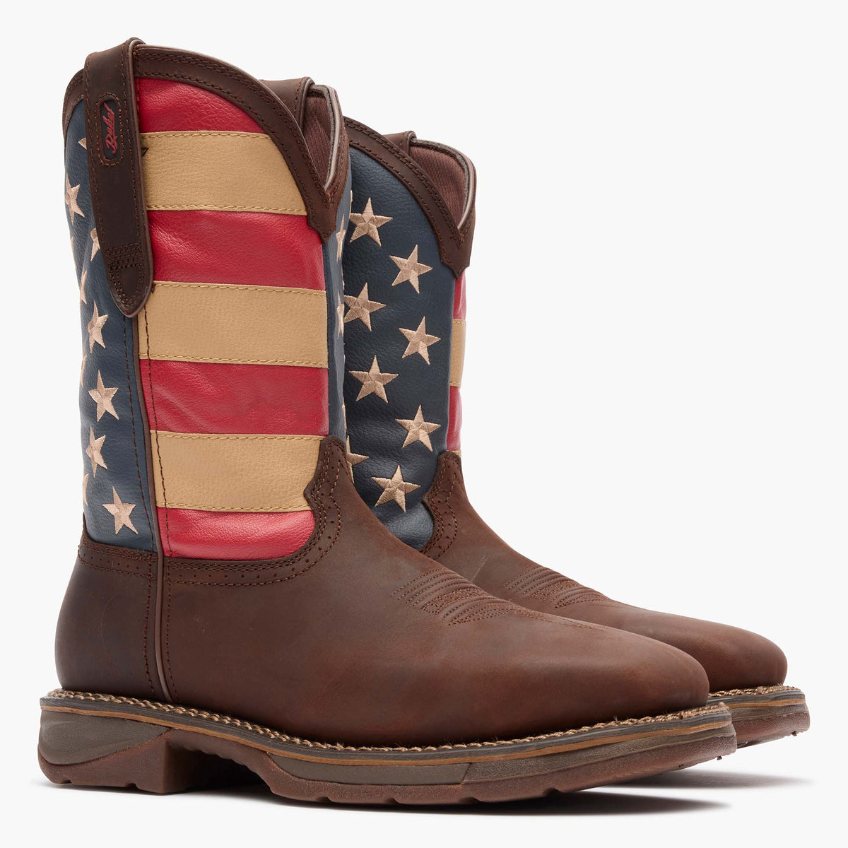 Pair of Durango DB020 Workin' Rebel steel toe boots with American flag shaft, front view
