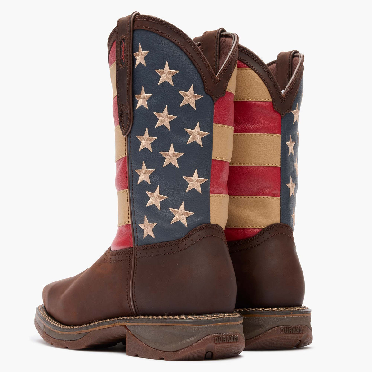 Back view of Durango DB020 Workin' Rebel steel toe boots showing the American flag design on the 11-inch shaft