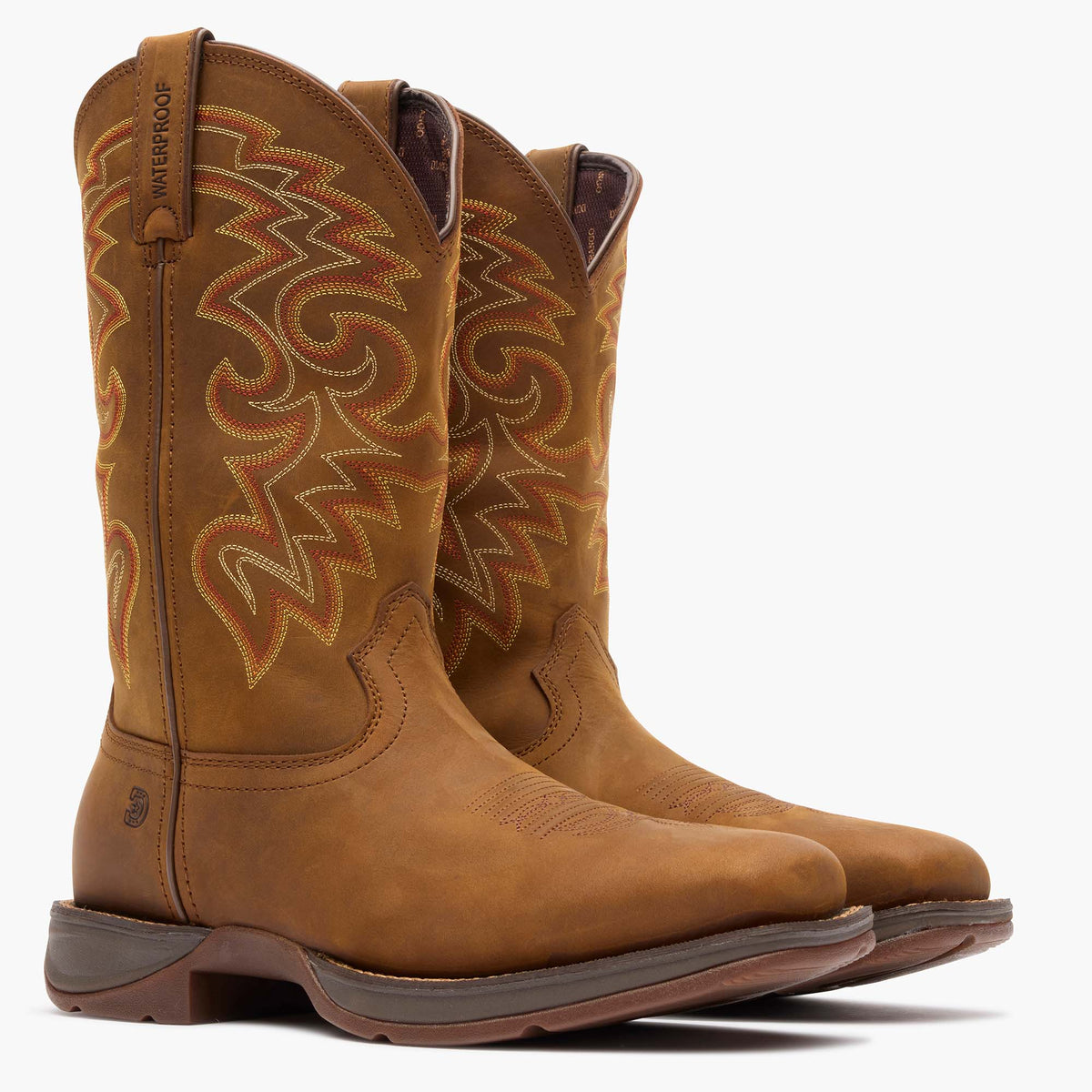Pair of Durango DDB0361 Rebel waterproof western boots in russet, available at Teres Western Wear in Dallas