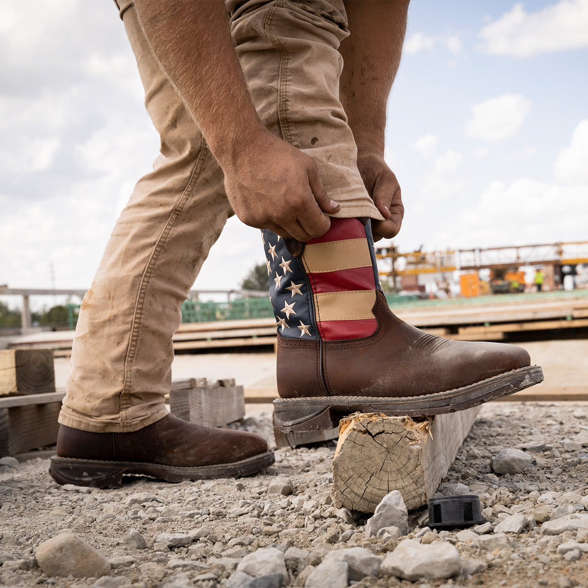 Durango DB020 Workin' Rebel steel toe work boots worn on a construction site, available at Teres Western Wear in Dallas