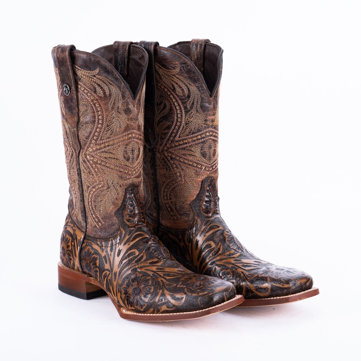 Pair of Tanner Mark men's TM205566 brown jungle hand-tooled cowboy boots, front angle view